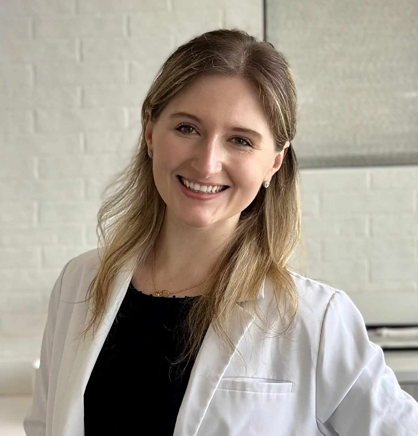 Dr. Kateryna Huz - Board Certified Orthodontist